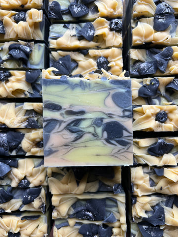 Sunflower Sandalwood soap with piped Sunflowers on top. 